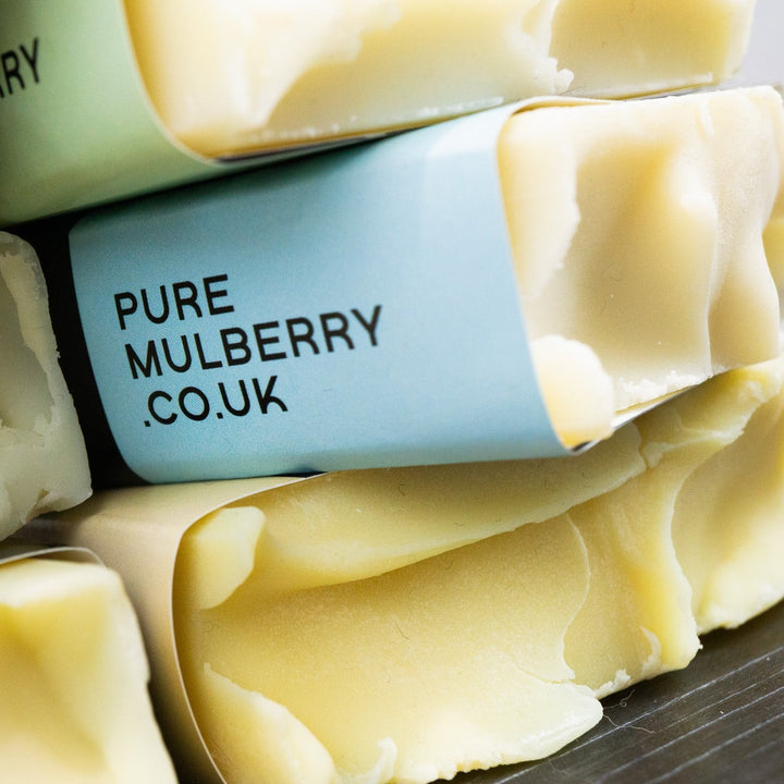 Stack of soap bars showing pure mulberry label