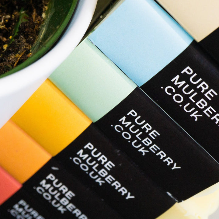 Different coloured labels showing pure mulberry website