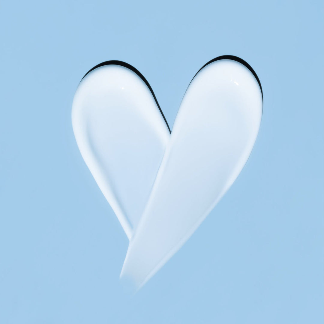 Two smears of cream in the shape of a heart